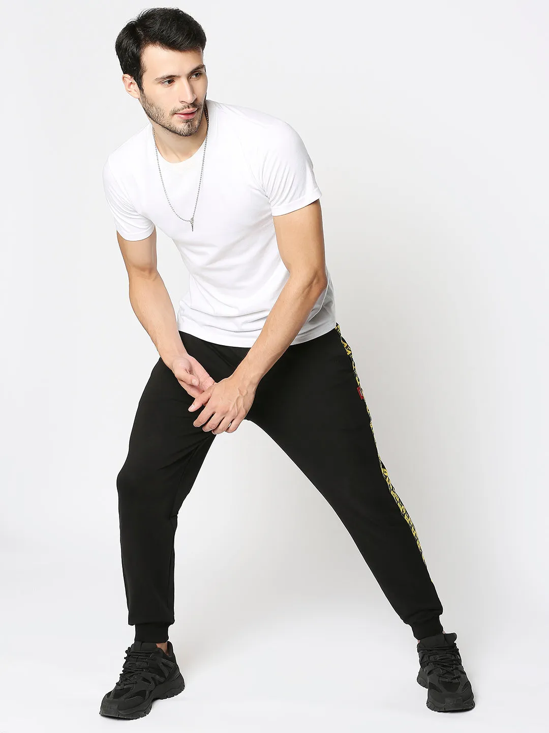 Disrupt black contrast logo tape comfort fit joggers for Mens