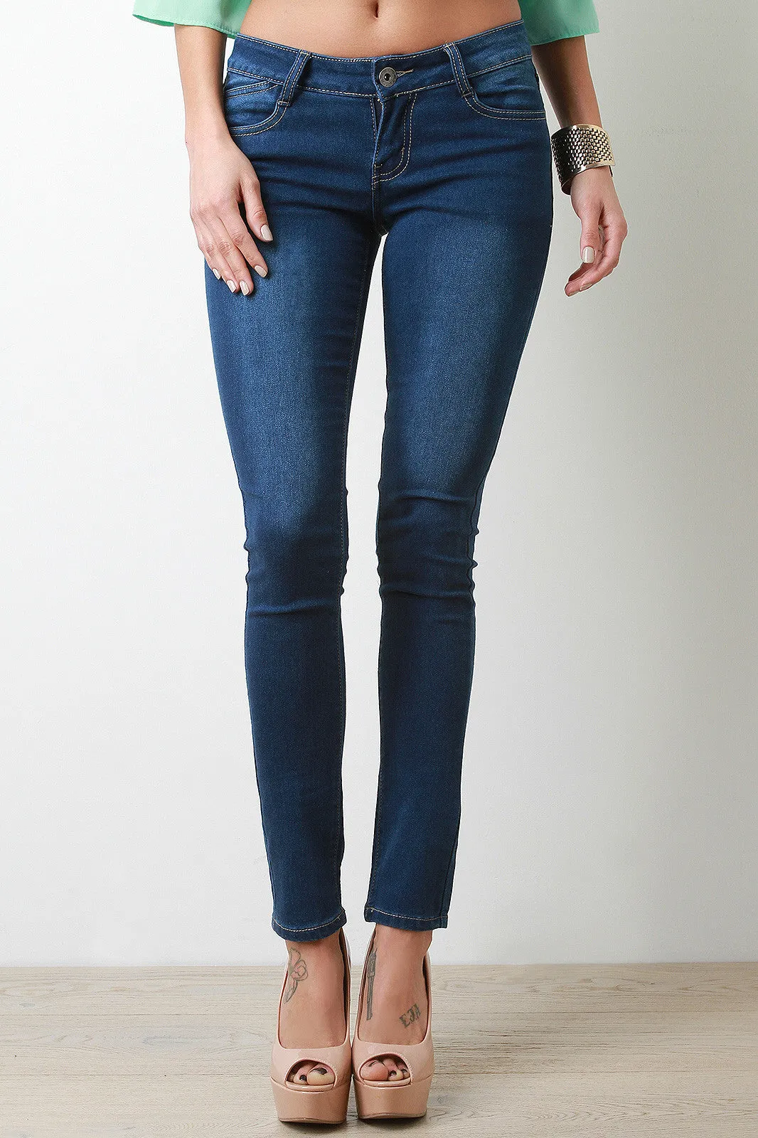 Low Rise Medium Wash Taper Jeans