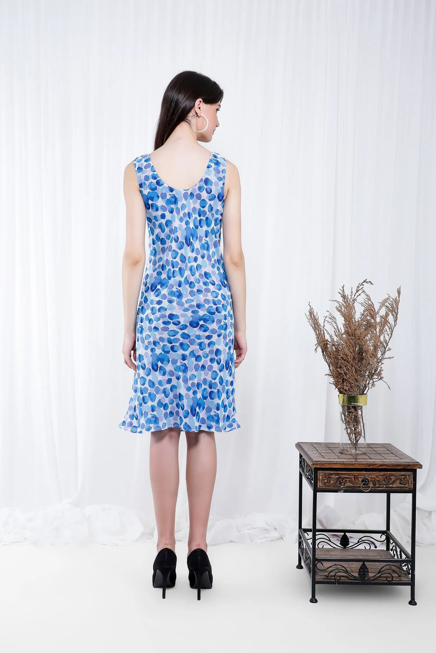 THE SLOUCHY REVERSIBLE DRESS IN POLKA BLUE